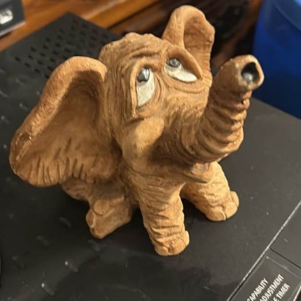 Whimsical Carved Wood-Look Elephant Figurine